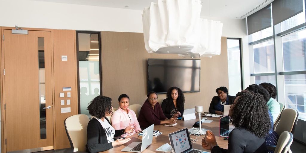diverse team brainstorming in modern office