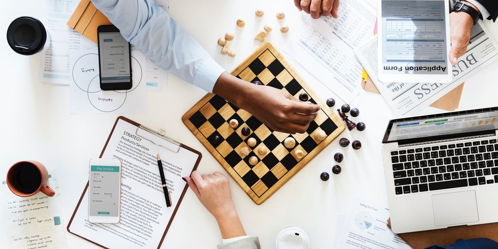 business leaders discussing strategy in a modern office
