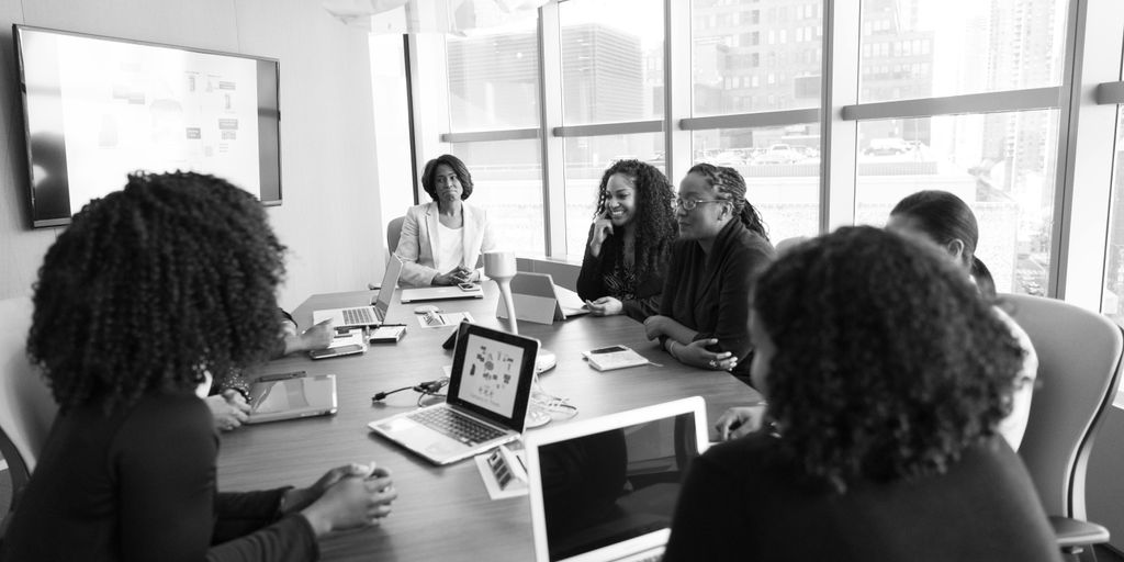 entrepreneur presenting idea to investors in modern office