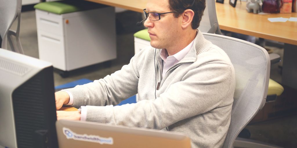 startup team working with technology tools and services in a modern office